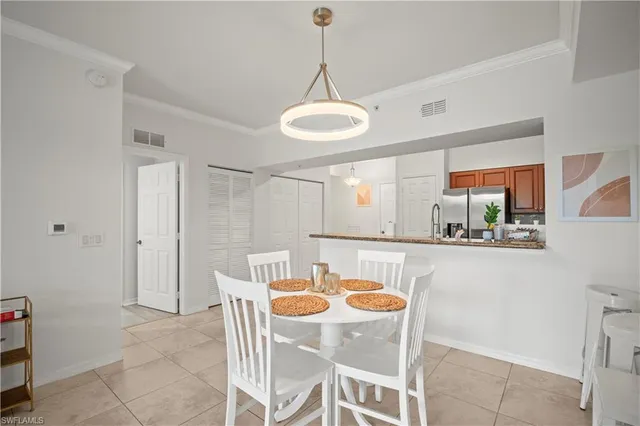 $294,900 | 10121 Villagio Palms Way, Unit 102, Estero, FL 33928