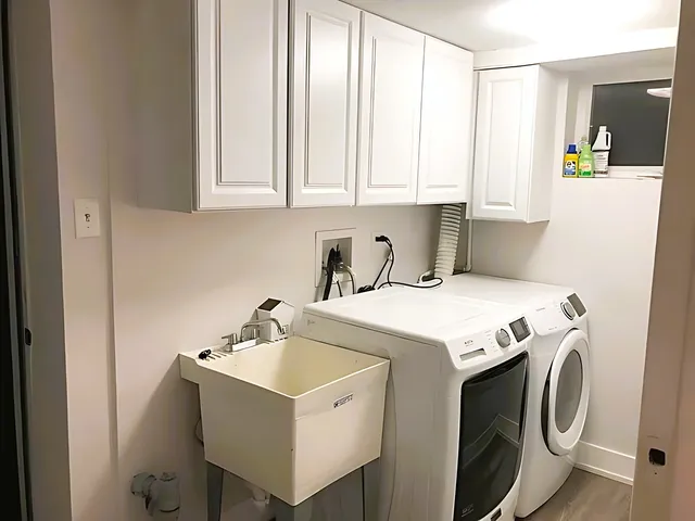 a utility room with dryer and washer