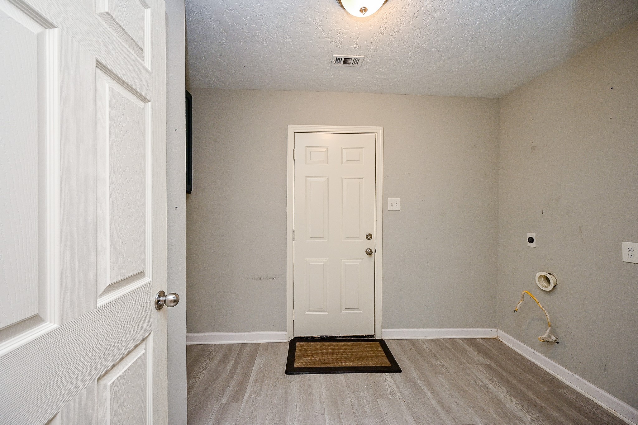 602 Mobile Court Conroe, TX 77302 - Photo 12 of 30 wooden floor in an empty room