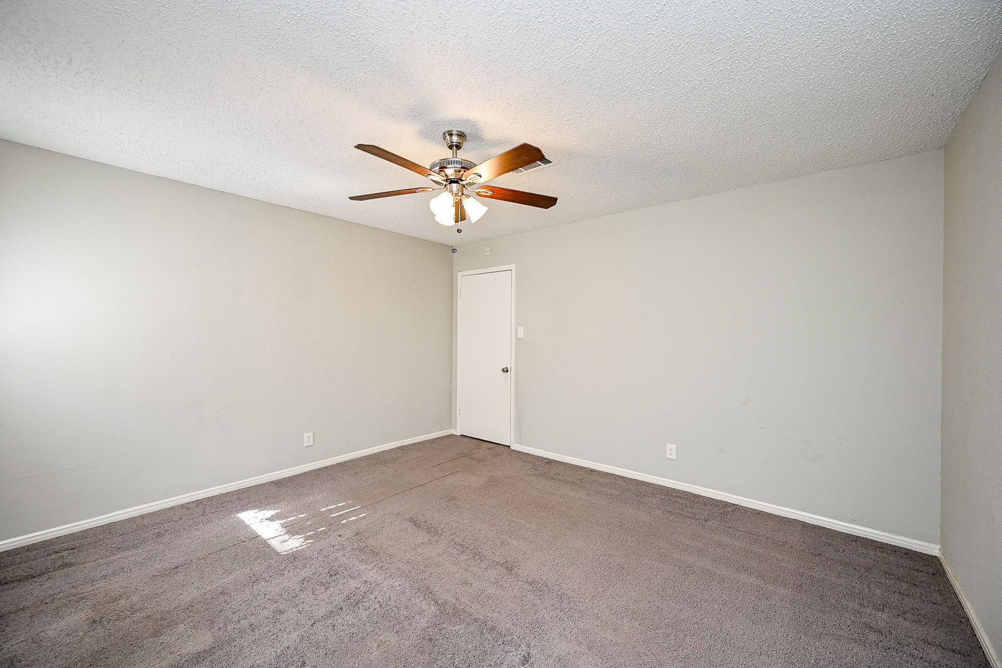 602 Mobile Court Conroe, TX 77302 - Photo 24 of 30 a view of an empty room with a fan