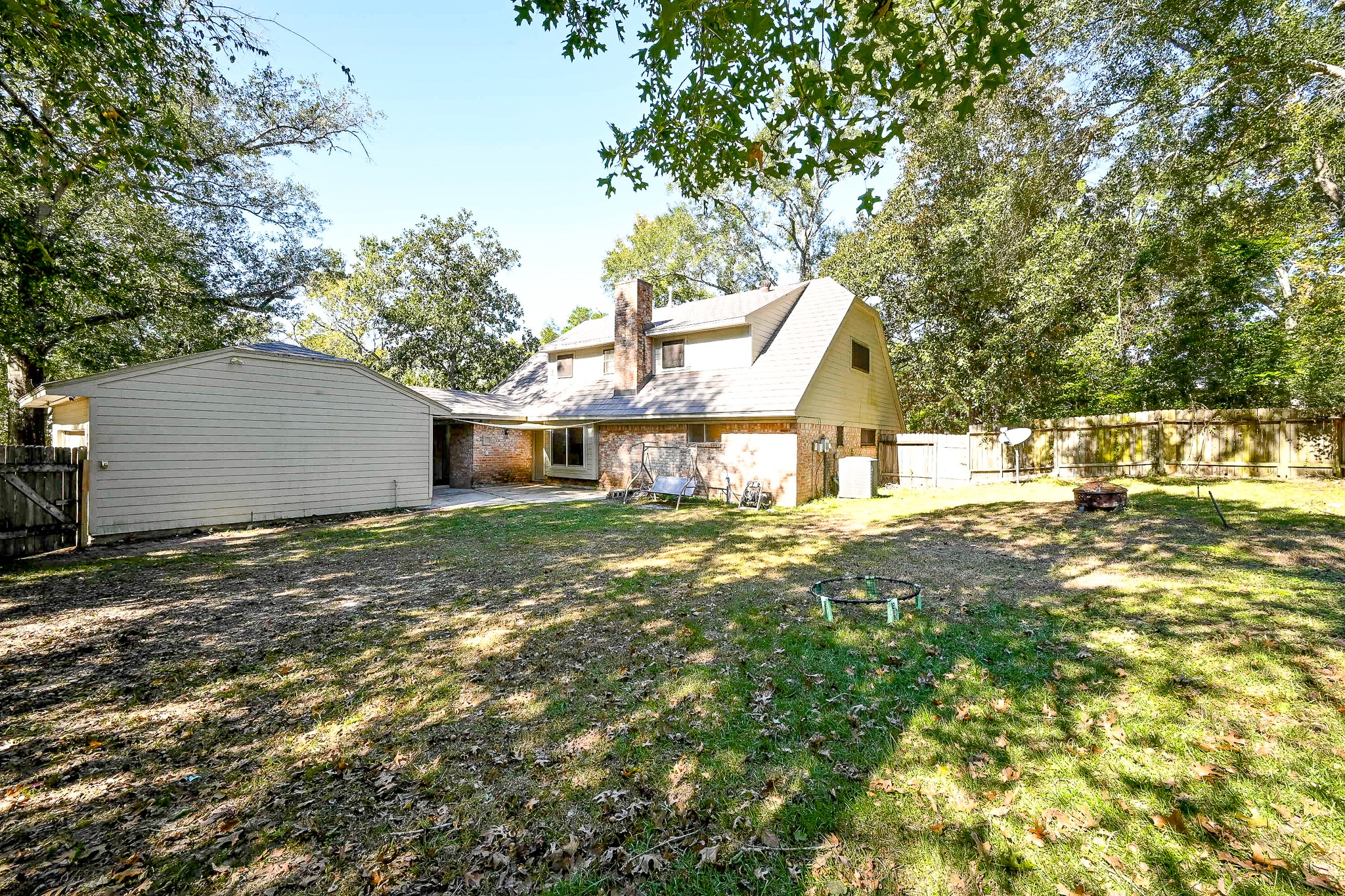 602 Mobile Court Conroe, TX 77302 - Photo 29 of 30 a view of a house with a yard
