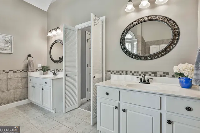 a view of a house with backyard porch and sitting area