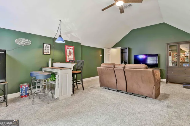 a view of a house with backyard porch and porch