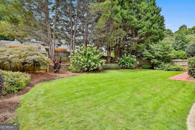 a view of a golf course with a lake