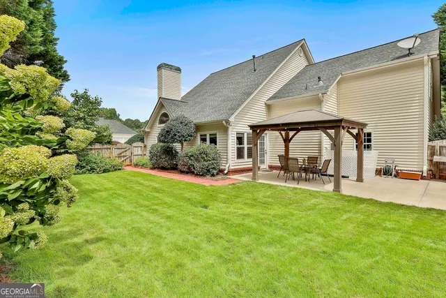 a view of a park with large trees