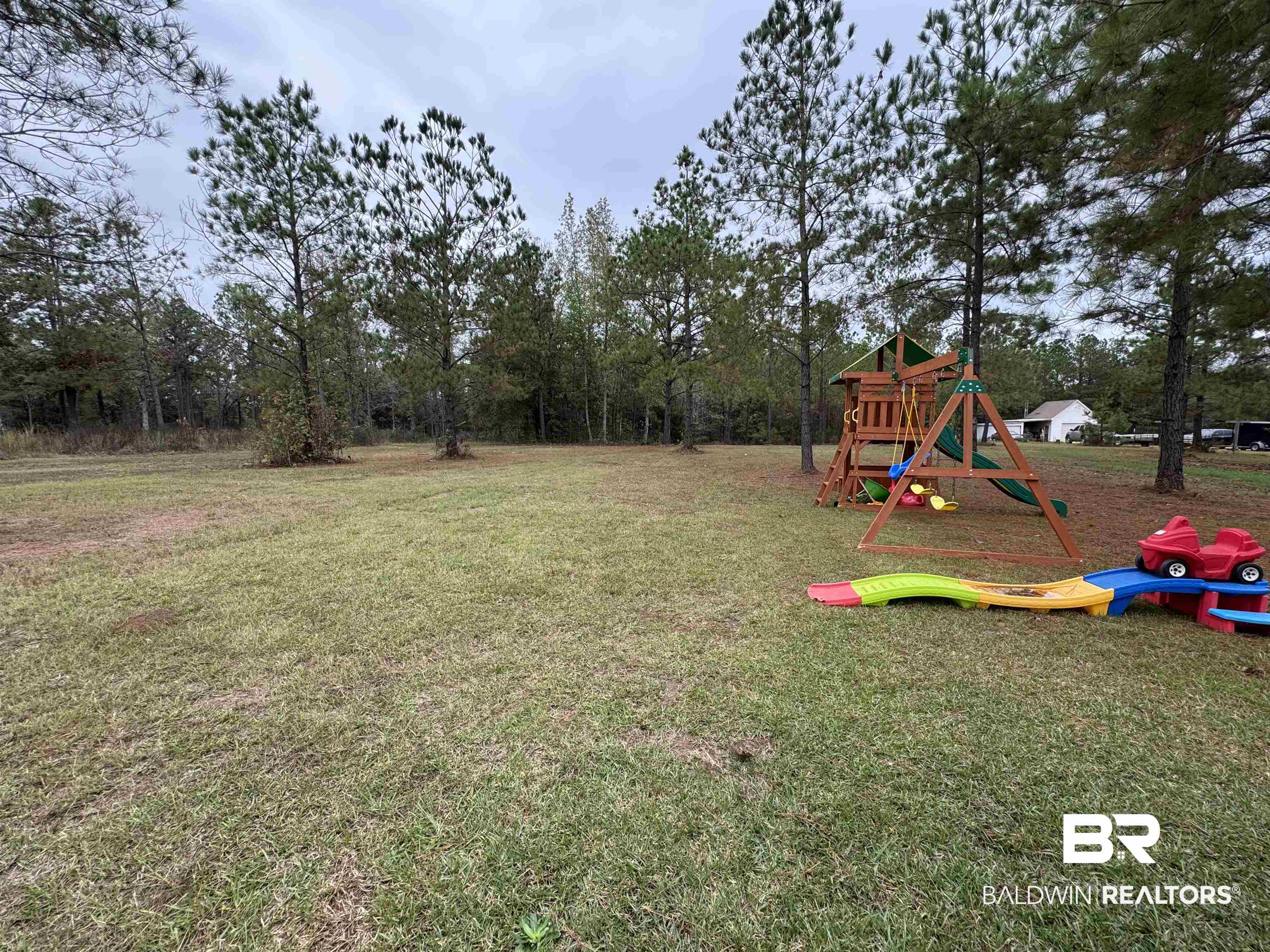 370 Dianne Road Frisco City, AL 36445 - Photo 5 of 41 View of yard featuring a playground