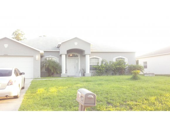 a black and white photo of a big room