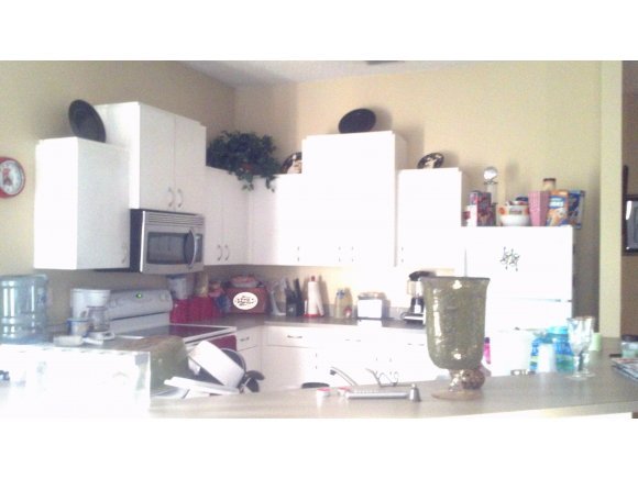 2482 Southeast Ralph Palm Bay, FL 32909 - Photo 3 of 3 a bathroom with a sink mirror and vanity