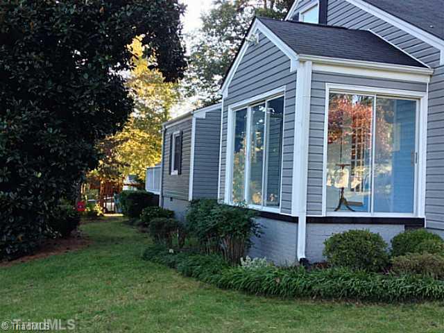 1701 Independence Road Greensboro, NC 27408 - Photo 12 of 15 Sunroom. Floor to ceiling windows make this a great place to soak up the sun.