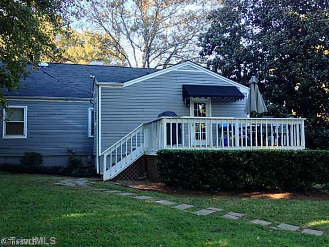 1701 Independence Road Greensboro, NC 27408 - Photo 15 of 15 Exterior Back. Nice, large deck for grilling and entertaining or just relaxing.