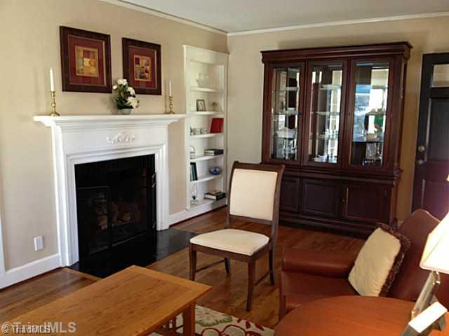 1701 Independence Road Greensboro, NC 27408 - Photo 3 of 15 Living Room. This room boasts a cozy fireplace, and craftsman built in shelves.