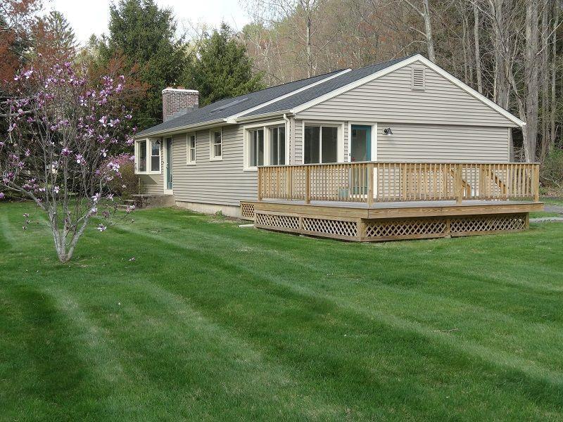 35 Cherry Brook Road Canton, CT 06019 - Photo 1 of 1 a front view of a house with a yard