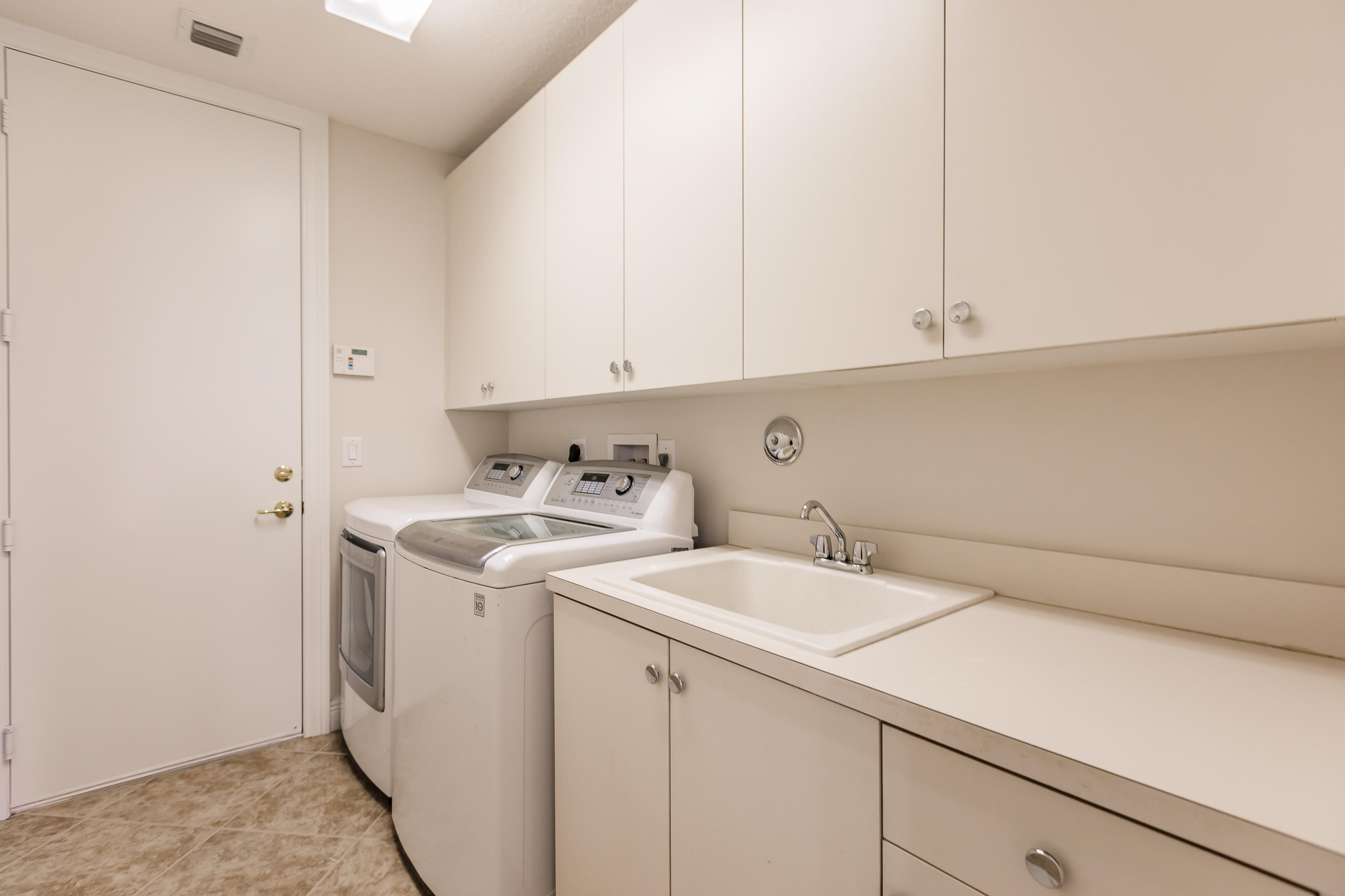 11308 Misty Ridge Way Boynton Beach, FL 33473 - Photo 35 of 49 Laundry room