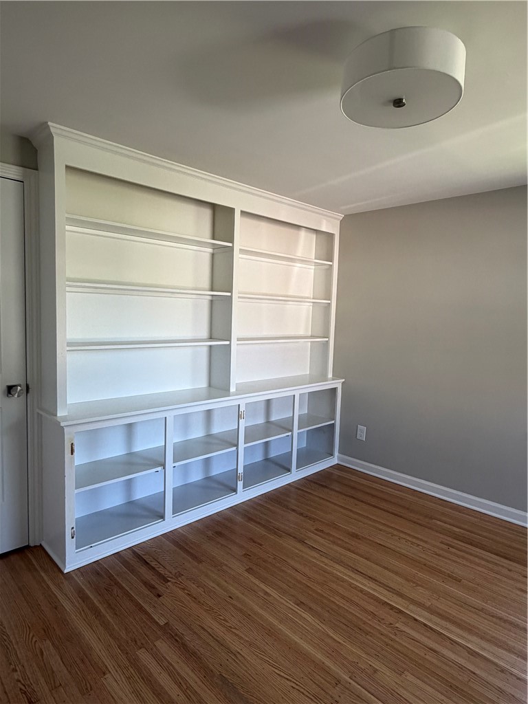 61 Fernboro Road Brighton, NY 14618 - Photo 10 of 15 Bedroom #1 - Wall of Built-ins ( doors have benn installed on bottom )