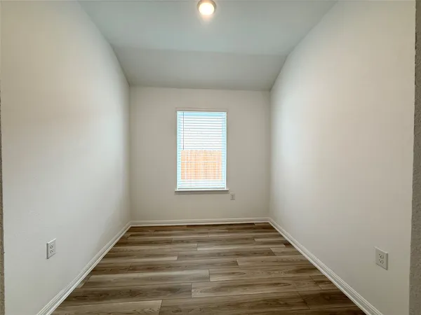 a view of kitchen with wooden floor