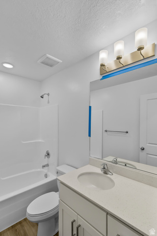 3014 South 265th Street West Logan, UT 84321 - Photo 16 of 25 Bathroom featuring a white vanity with a light-colored countertop, an undermount sink, and chrome fixtures