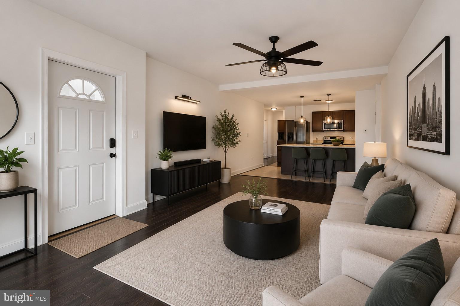 2467 79th Avenue, Unit 1 Philadelphia, PA 19150 - Photo 5 of 16 a living room with furniture and a flat screen tv