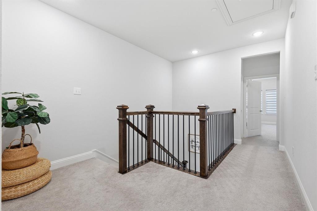 1567 Windermere Way Dallas, TX 75234 - Photo 14 of 26 a view of a hallway