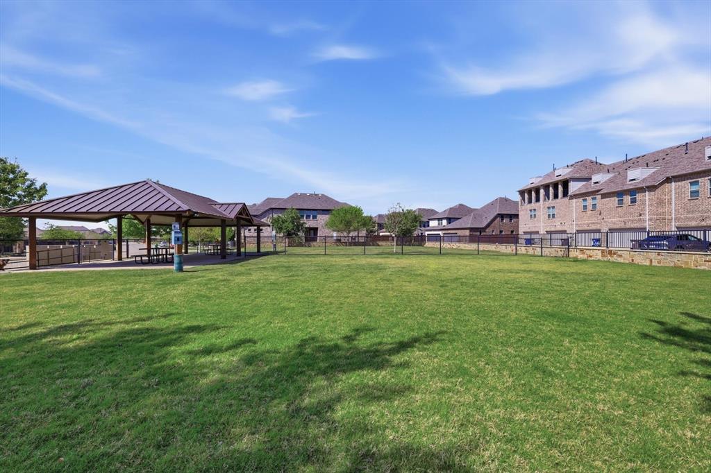 1567 Windermere Way Dallas, TX 75234 - Photo 22 of 26 a view of house with garden