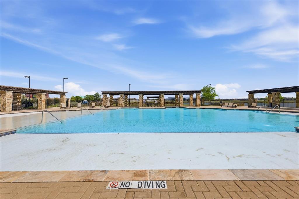 1567 Windermere Way Dallas, TX 75234 - Photo 24 of 26 a view of swimming pool