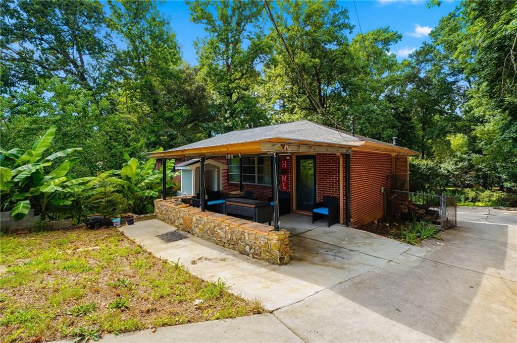 430 Church Road Southwest Marietta, GA 30060 - Photo 1 of 35 a view of a house with a yard