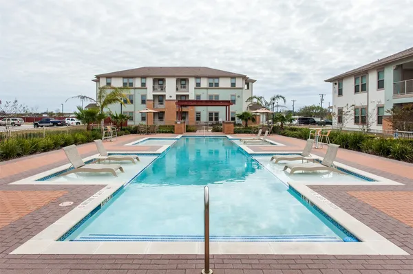 a view of a patio with a yard
