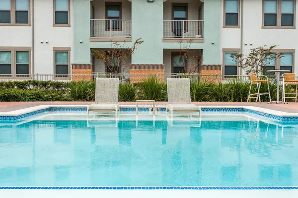a swimming pool with outdoor view