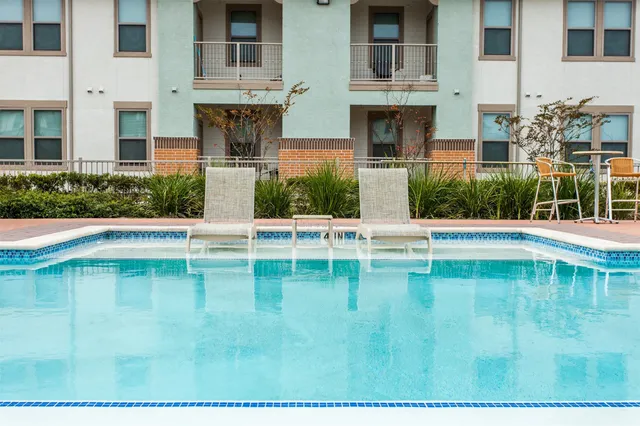 a swimming pool with outdoor view
