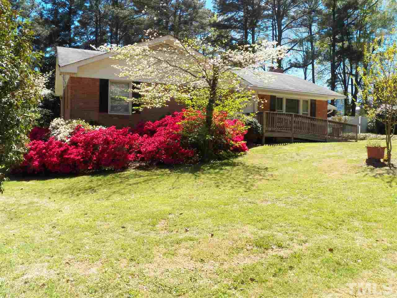 132 East Rowan Street Raleigh, NC 27609 - Photo 1 of 24 a front view of house with yard