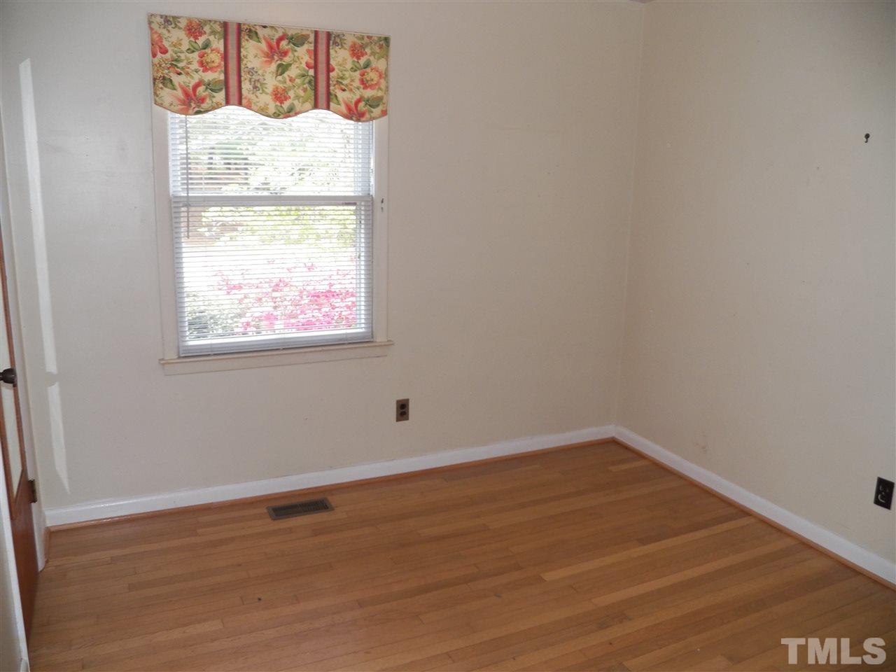 132 East Rowan Street Raleigh, NC 27609 - Photo 14 of 24 an empty room with a window