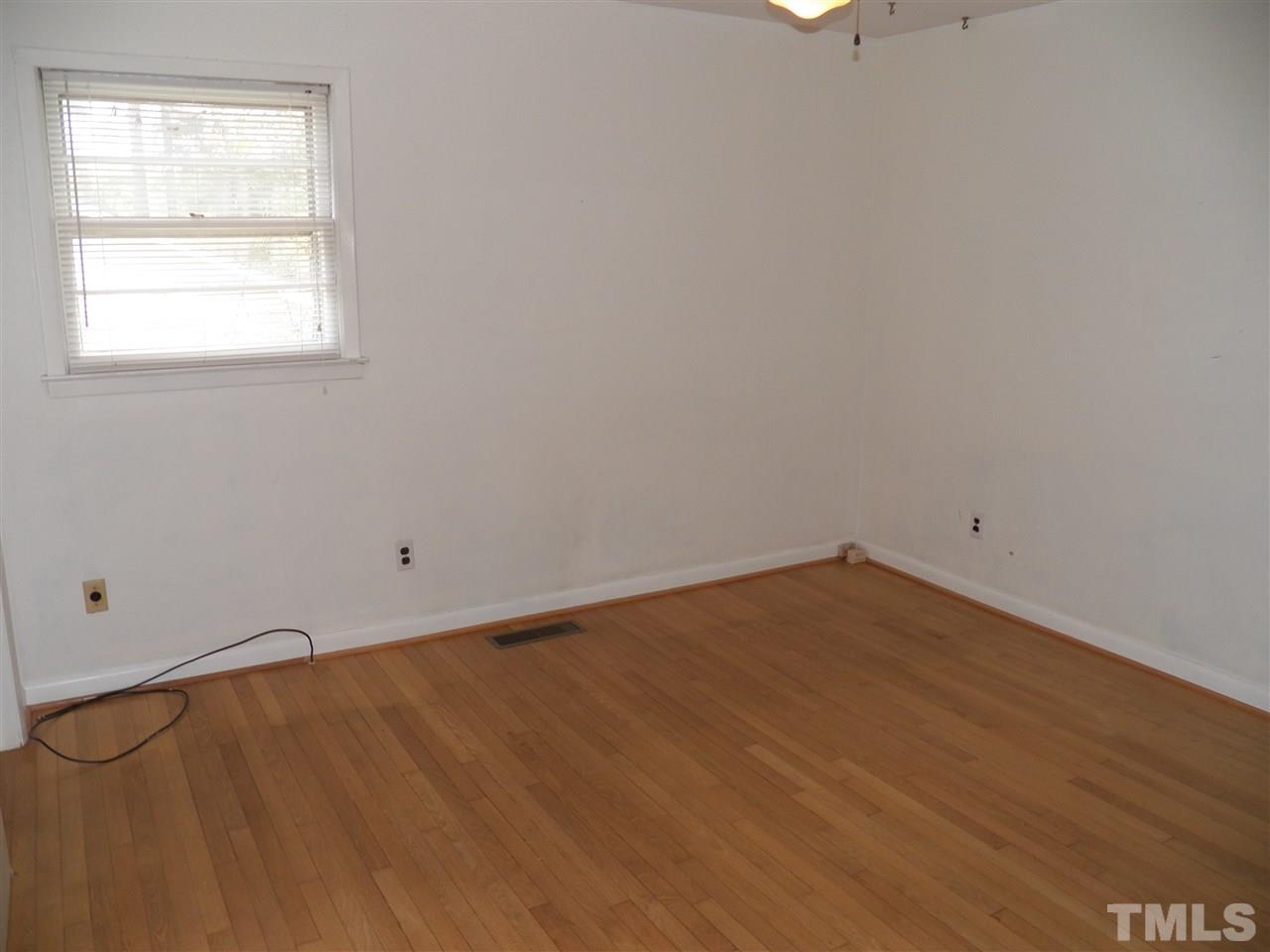 132 East Rowan Street Raleigh, NC 27609 - Photo 15 of 24 an empty room with a window