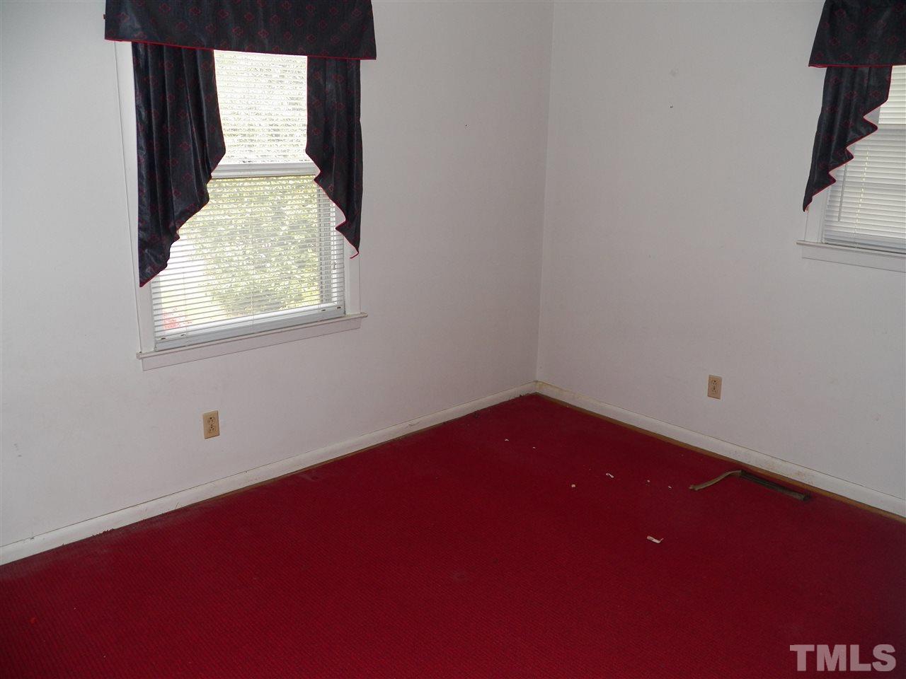 132 East Rowan Street Raleigh, NC 27609 - Photo 16 of 24 an empty room with a window