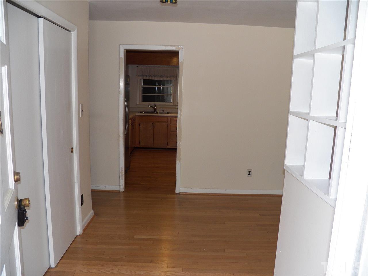 132 East Rowan Street Raleigh, NC 27609 - Photo 5 of 24 a view of a kitchen from the hallway