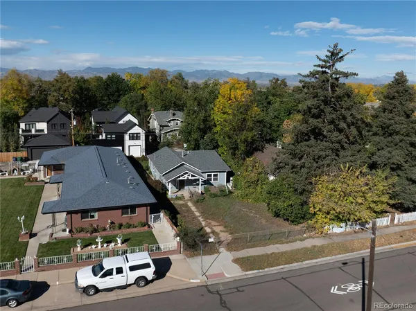 an aerial view of a house with a garden space