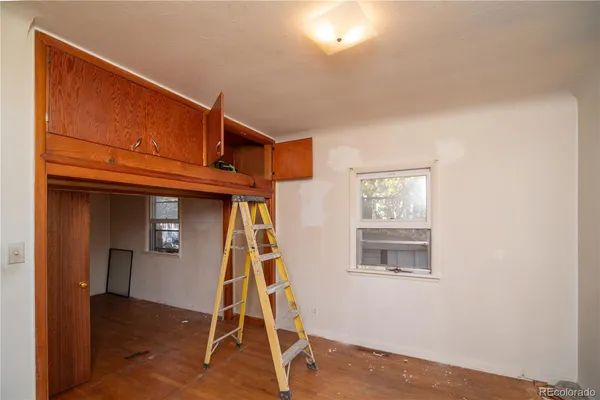 a view of entryway with wooden floor
