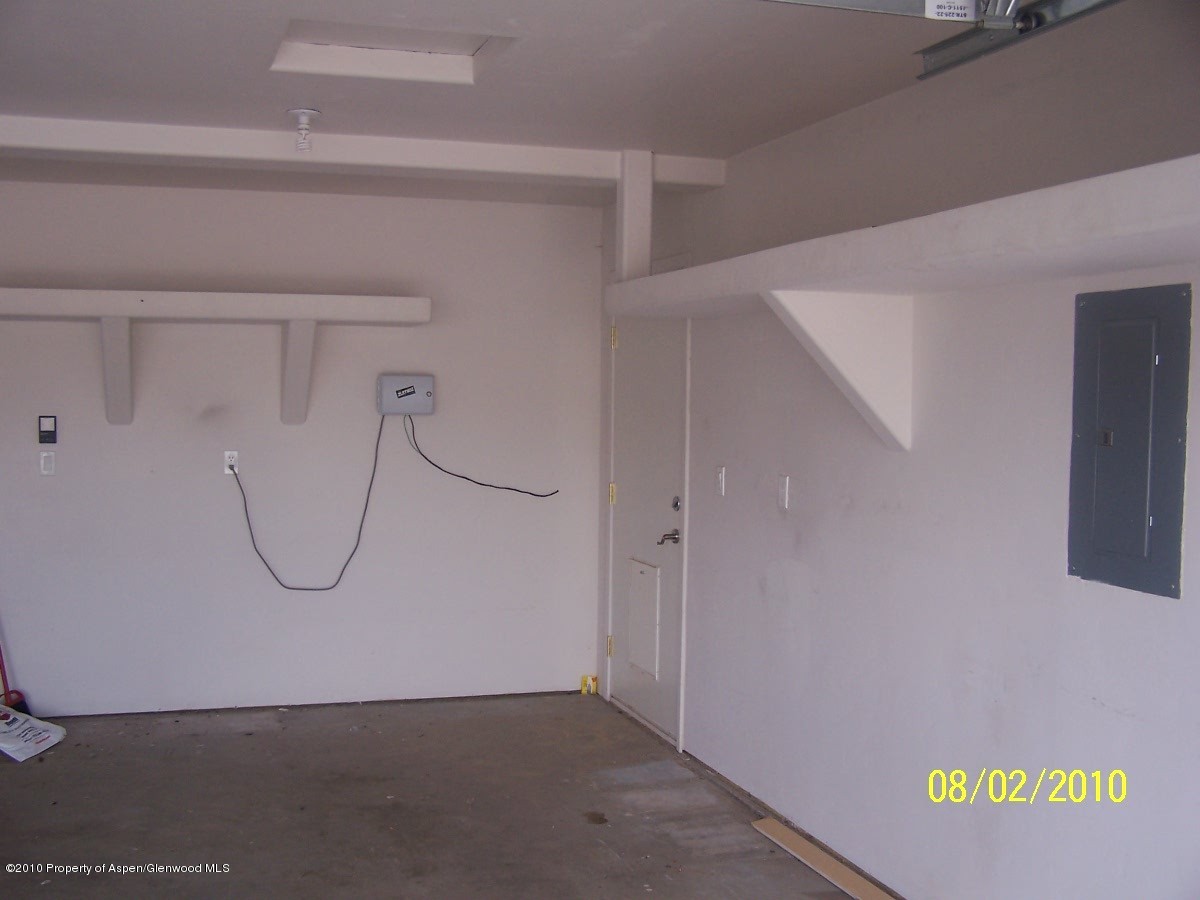 861 East 18th Street Rifle, CO 81650 - Photo 14 of 17 a view of a utility room with racks on the wall