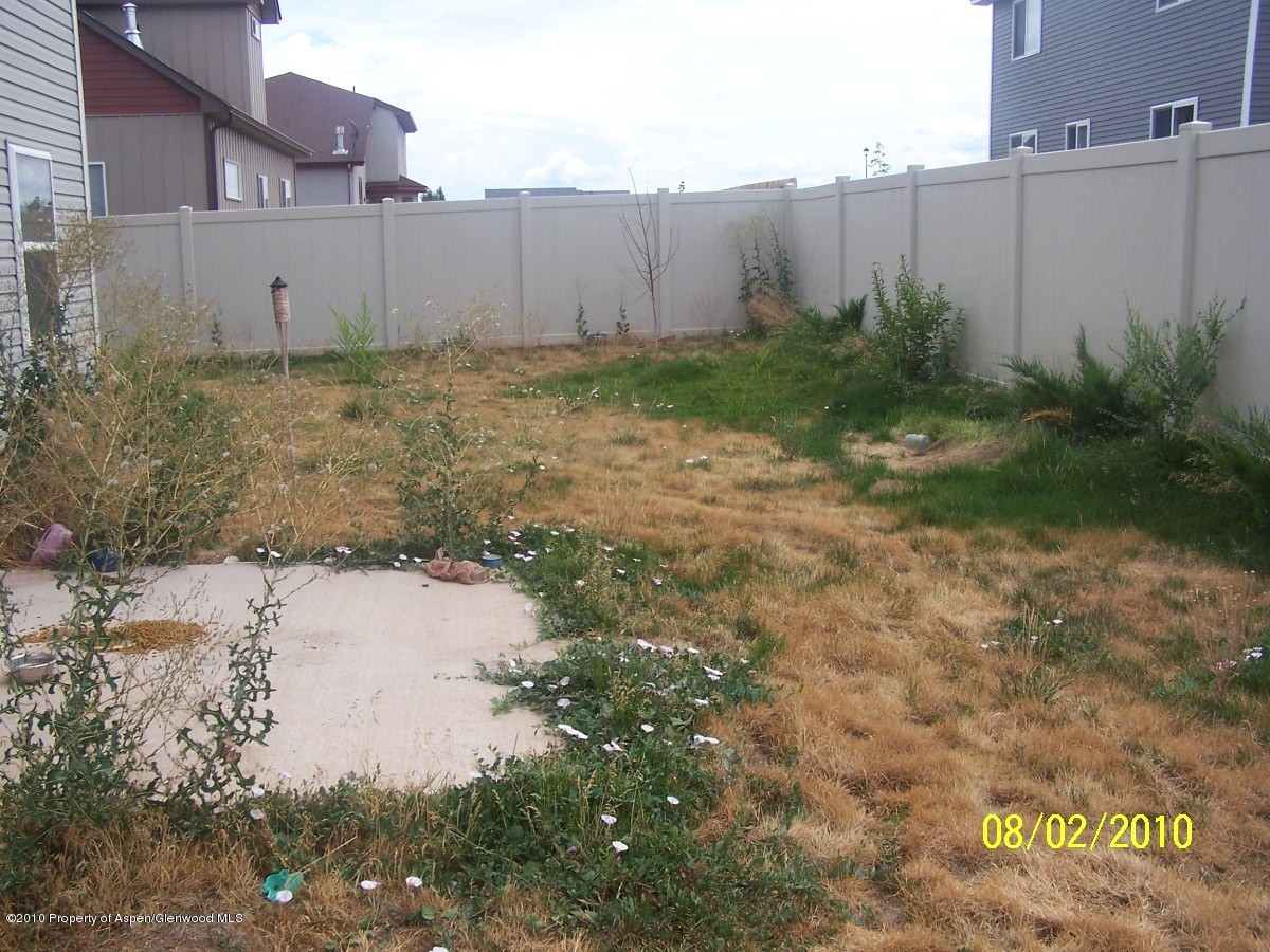 861 East 18th Street Rifle, CO 81650 - Photo 16 of 17 a view of backyard and wooden fence