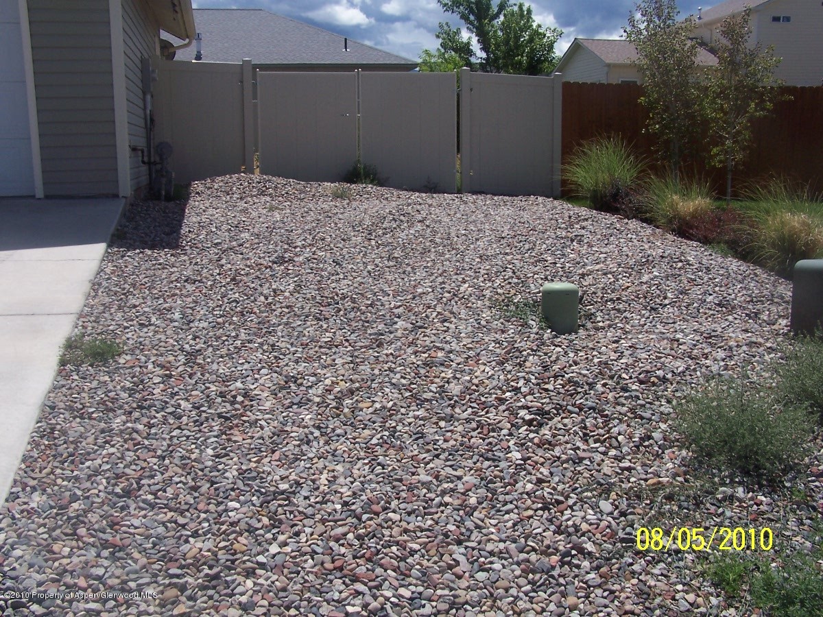 861 East 18th Street Rifle, CO 81650 - Photo 17 of 17 a backyard of a house