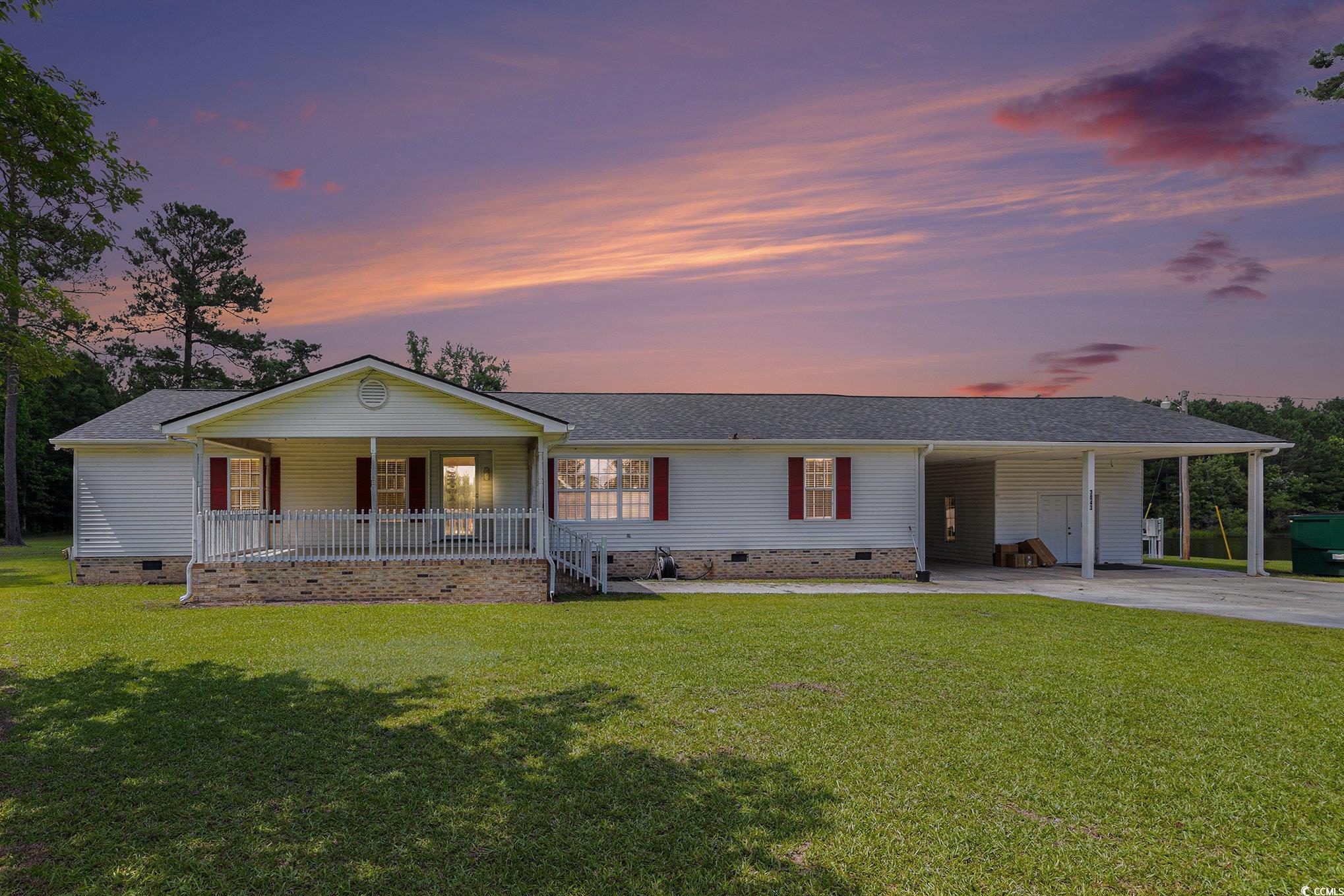 3843 Kelly Road Conway, SC 29526 - Photo 1 of 40 Ranch-style house with crawl space, covered porch, driveway, and a front yard