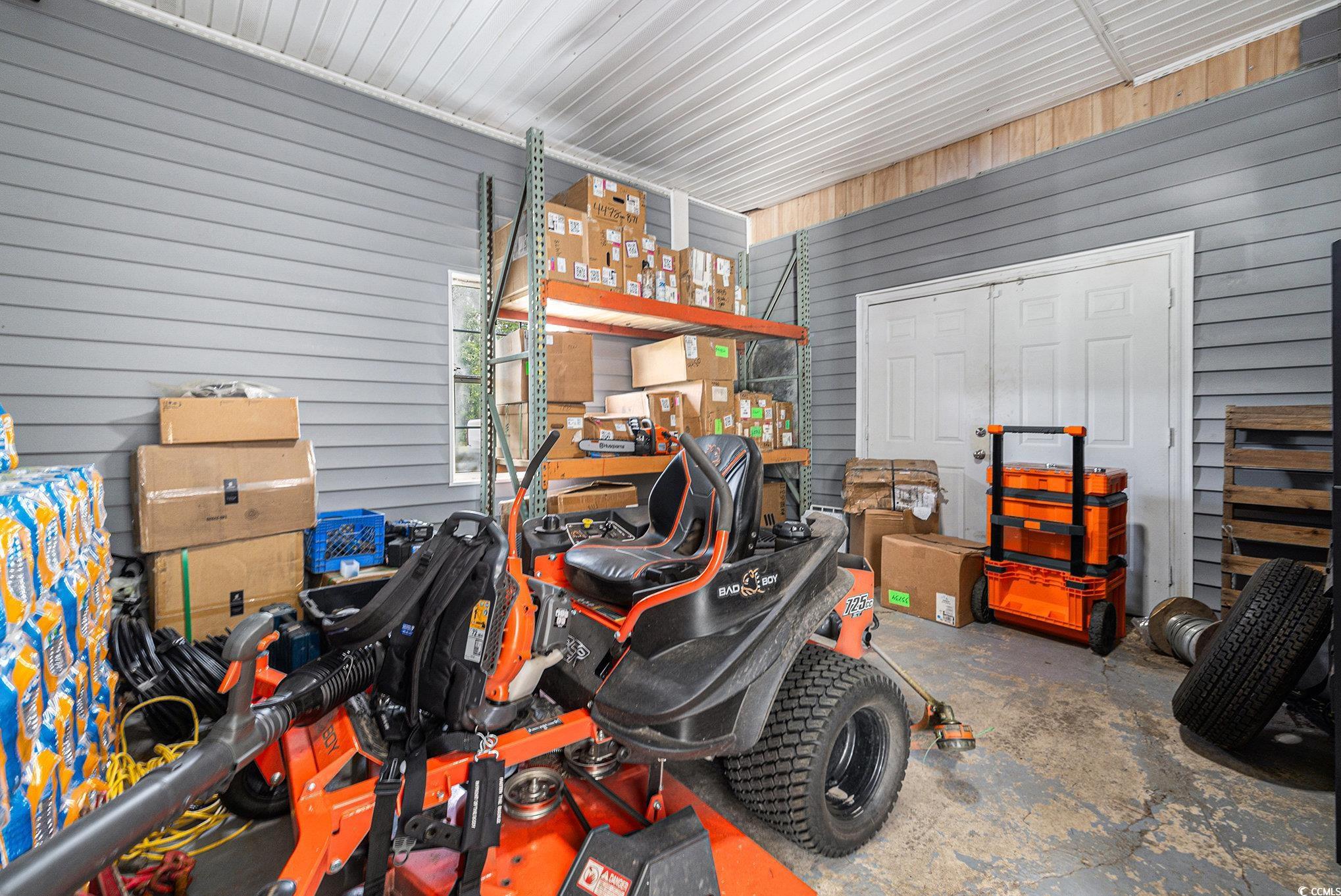 3843 Kelly Road Conway, SC 29526 - Photo 23 of 40 Garage with wooden walls