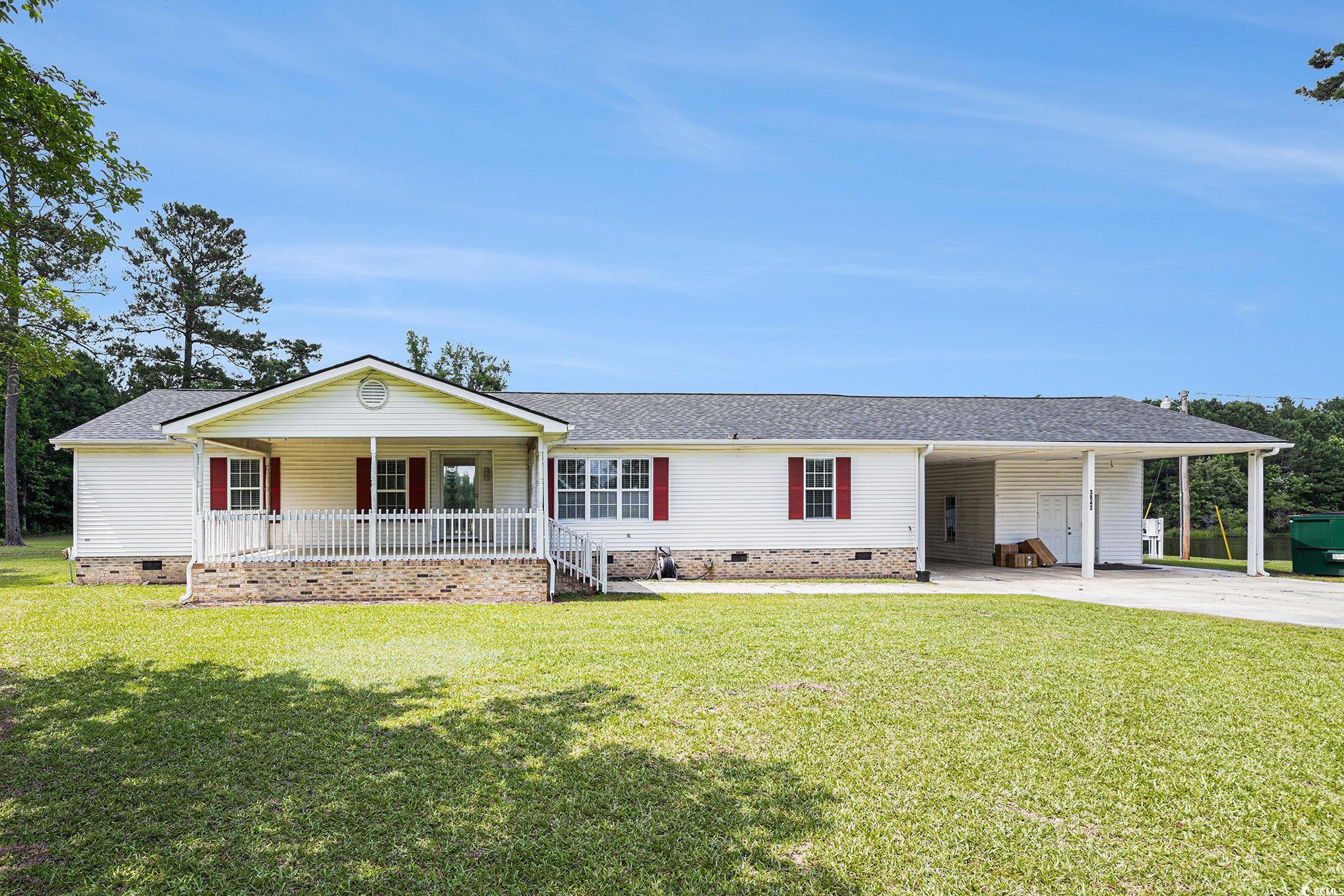 3843 Kelly Road Conway, SC 29526 - Photo 3 of 40 Single story home featuring crawl space, a porch, and a front lawn