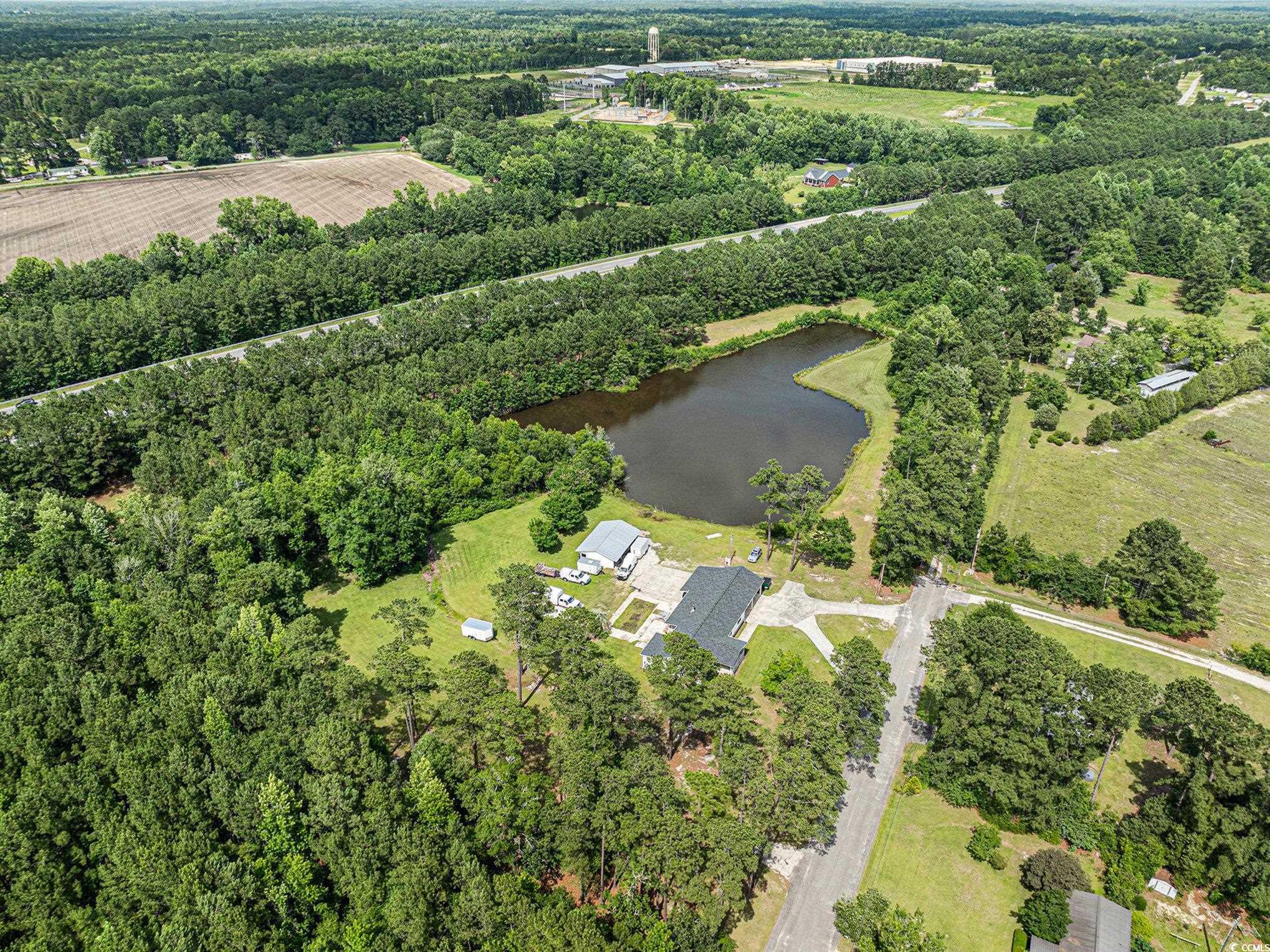 3843 Kelly Road Conway, SC 29526 - Photo 34 of 40 Aerial view of property and surrounding area with a nearby body of water