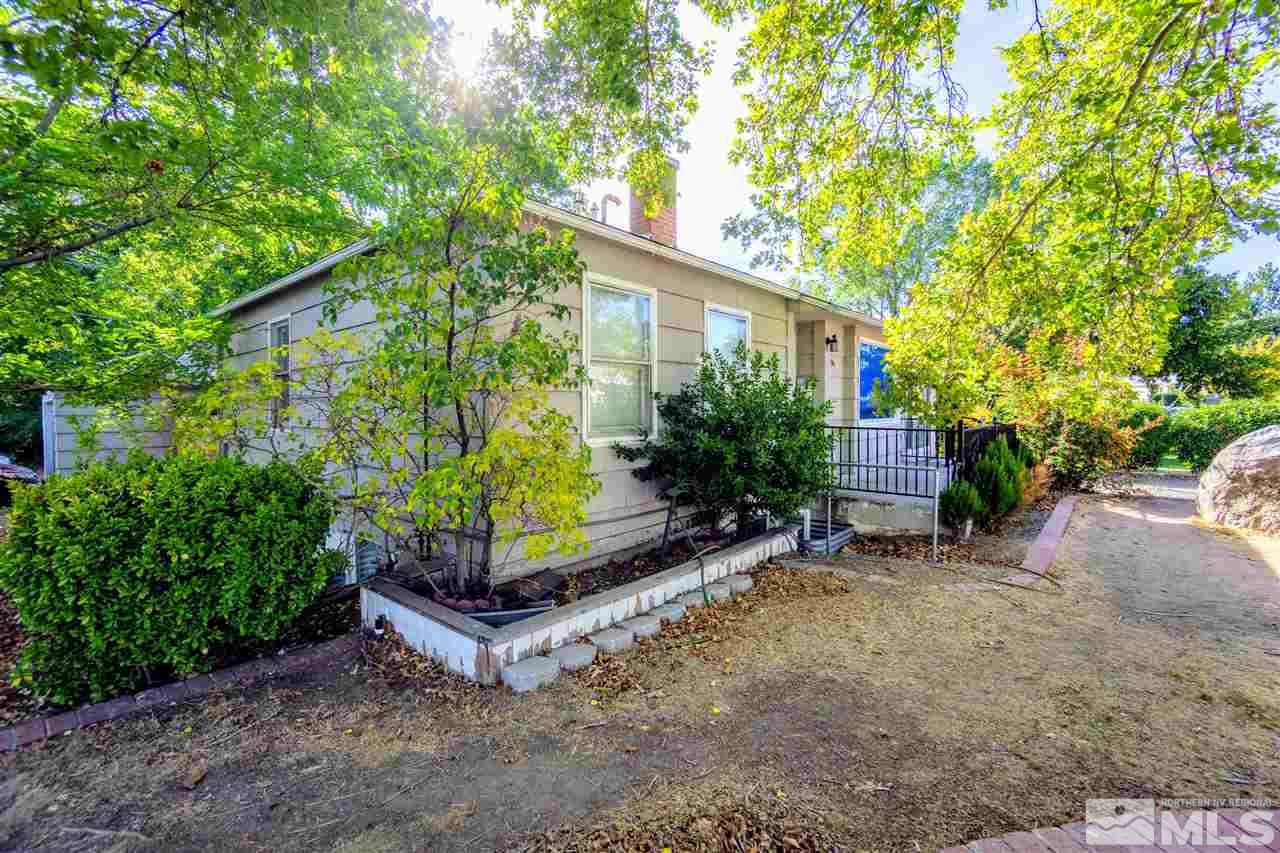 180 Bisby Street Reno, NV 89512 - Photo 12 of 13 a view of a backyard with plants and a patio