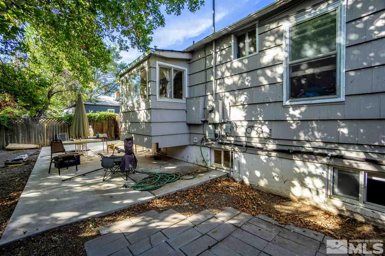 180 Bisby Street Reno, NV 89512 - Photo 13 of 13 a front view of a house with a yard
