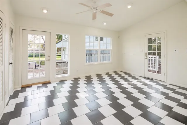 a view of a livingroom with wooden floor and a window