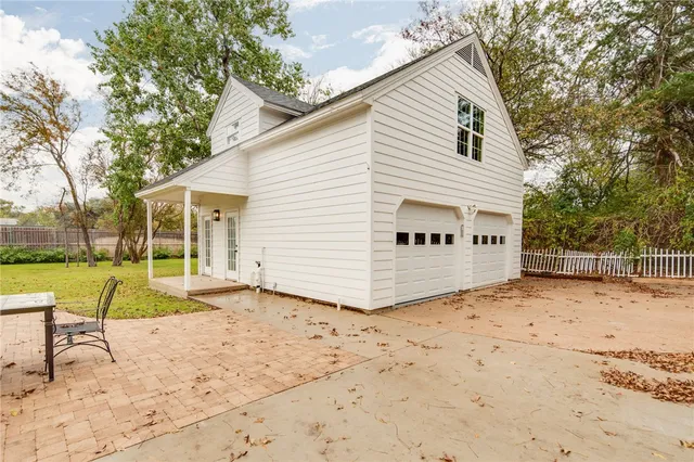 a view of backyard of a house