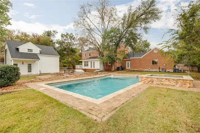 a view of outdoor space yard and swimming pool
