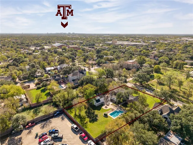 an aerial view of residential house with outdoor space
