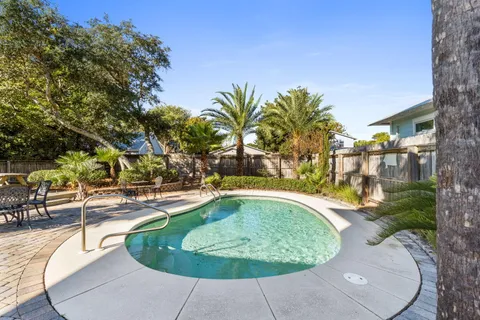 a view of a balcony with wooden floor