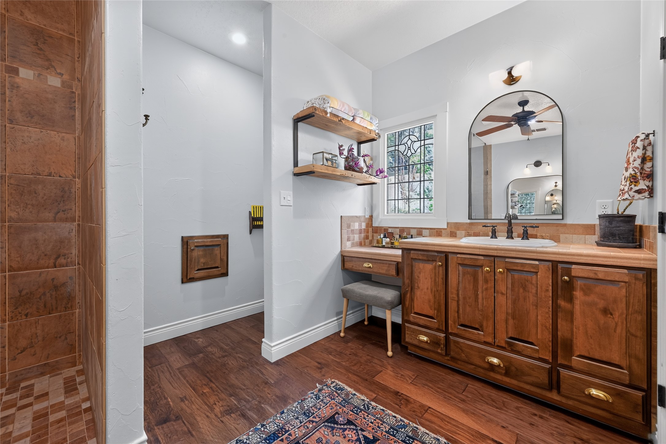 700 Willow Creek Road Salado, TX 76571 - Photo 21 of 39 Primary bath with dual vanities, updated lighting and mirrors and large walk-in closet